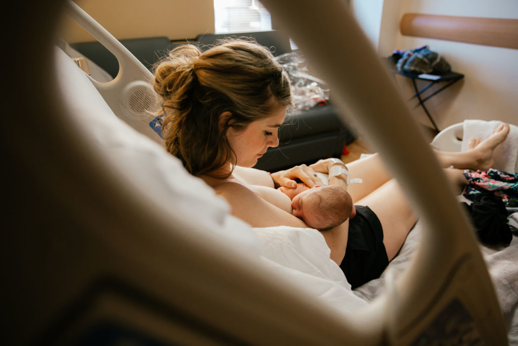 breastfeeding mother in hospital room