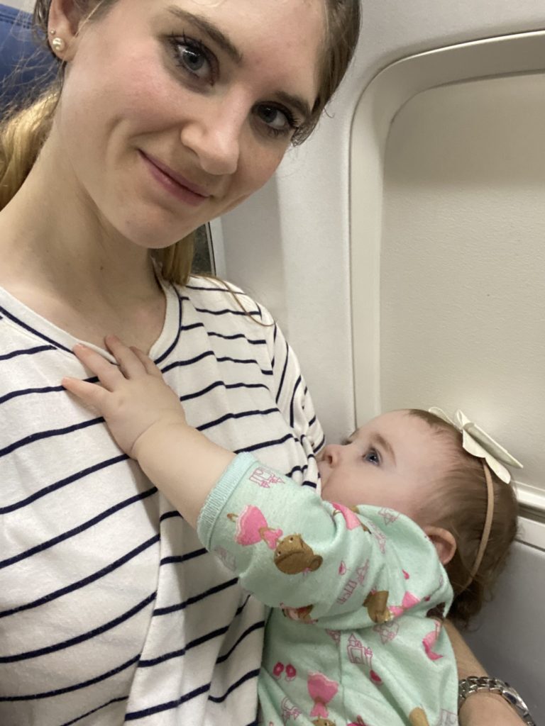 baby nursing on plane